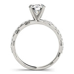 Exquisite 14kt White Gold Engagement Ring with 1/3 ct TW Diamond Setting