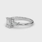 Elegant 3-Stone Emerald Ring with Tapered Baguette Sides