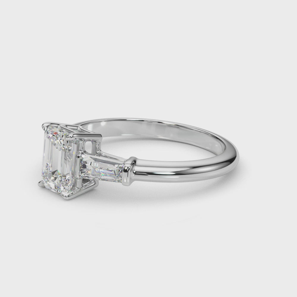Elegant 3-Stone Emerald Ring with Tapered Baguette Sides
