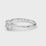 Exquisite 14kt White Gold Solitaire Round Engagement Ring Setting (3/4 ct Center Stone)