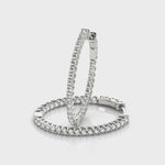 1.2 Inch Lustrous Oval Hoop Earrings in 14kt White Gold - SI2, H-I Diamond Quality