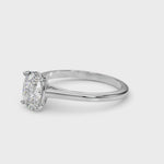 Exquisite 14kt White Gold Solitaire Oval Engagement Ring